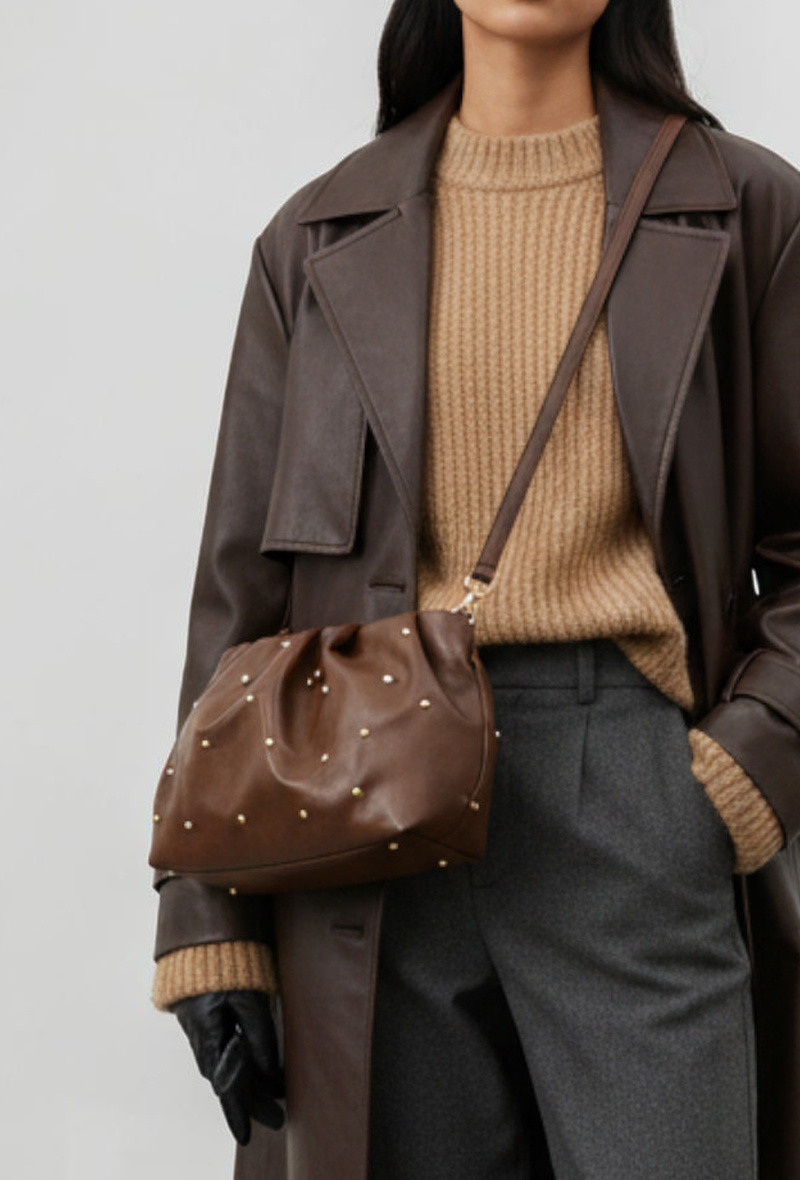 Wholesaler BESTINI (MIMOSA) - Bucket bag with golden buttons, studs, rope strap, zip closure