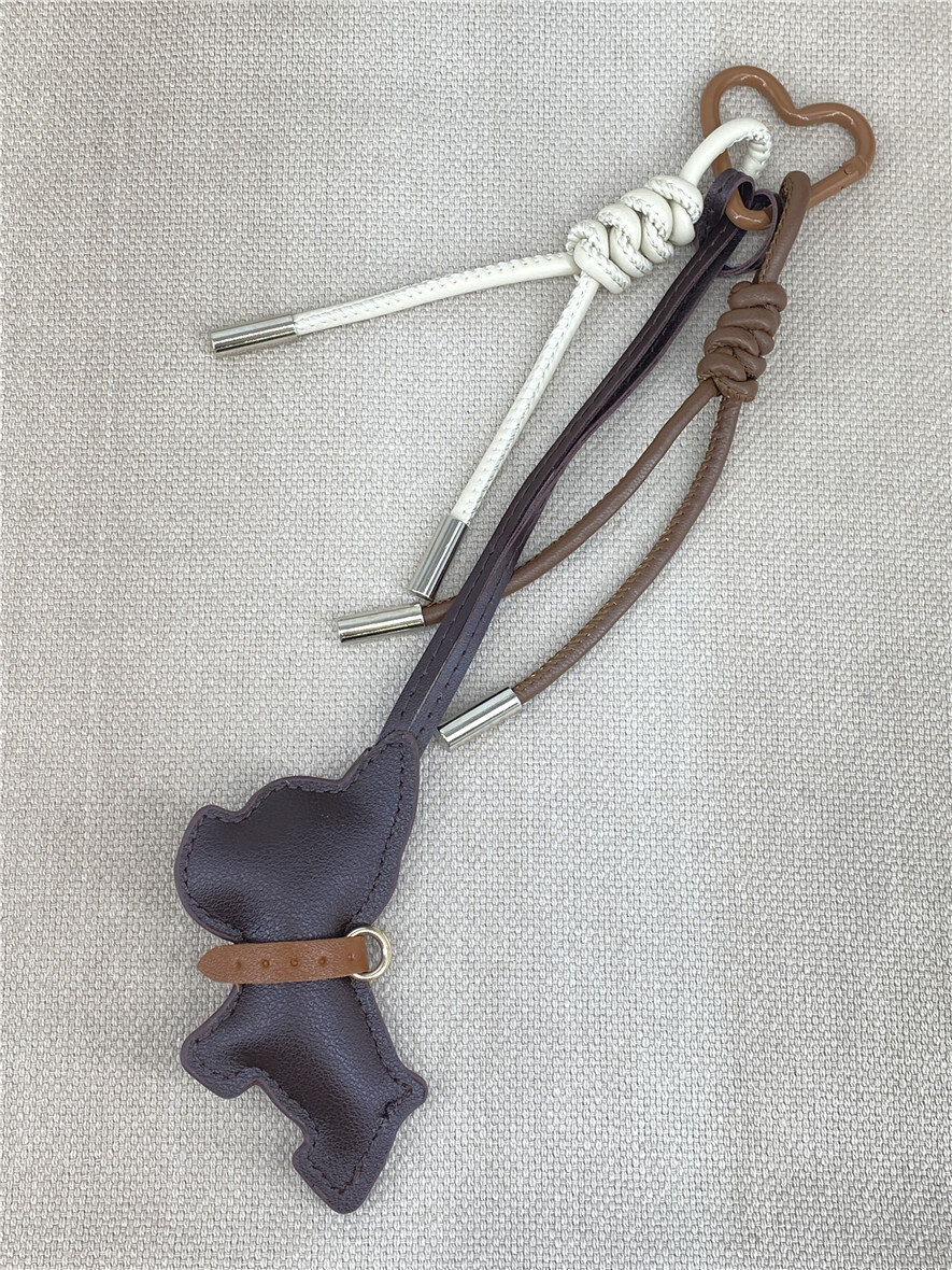 Grossiste Missra Paris - Porte-clé sac grigri triple fantaisie – 3 grigris décoratifs sur un seul mousqueton