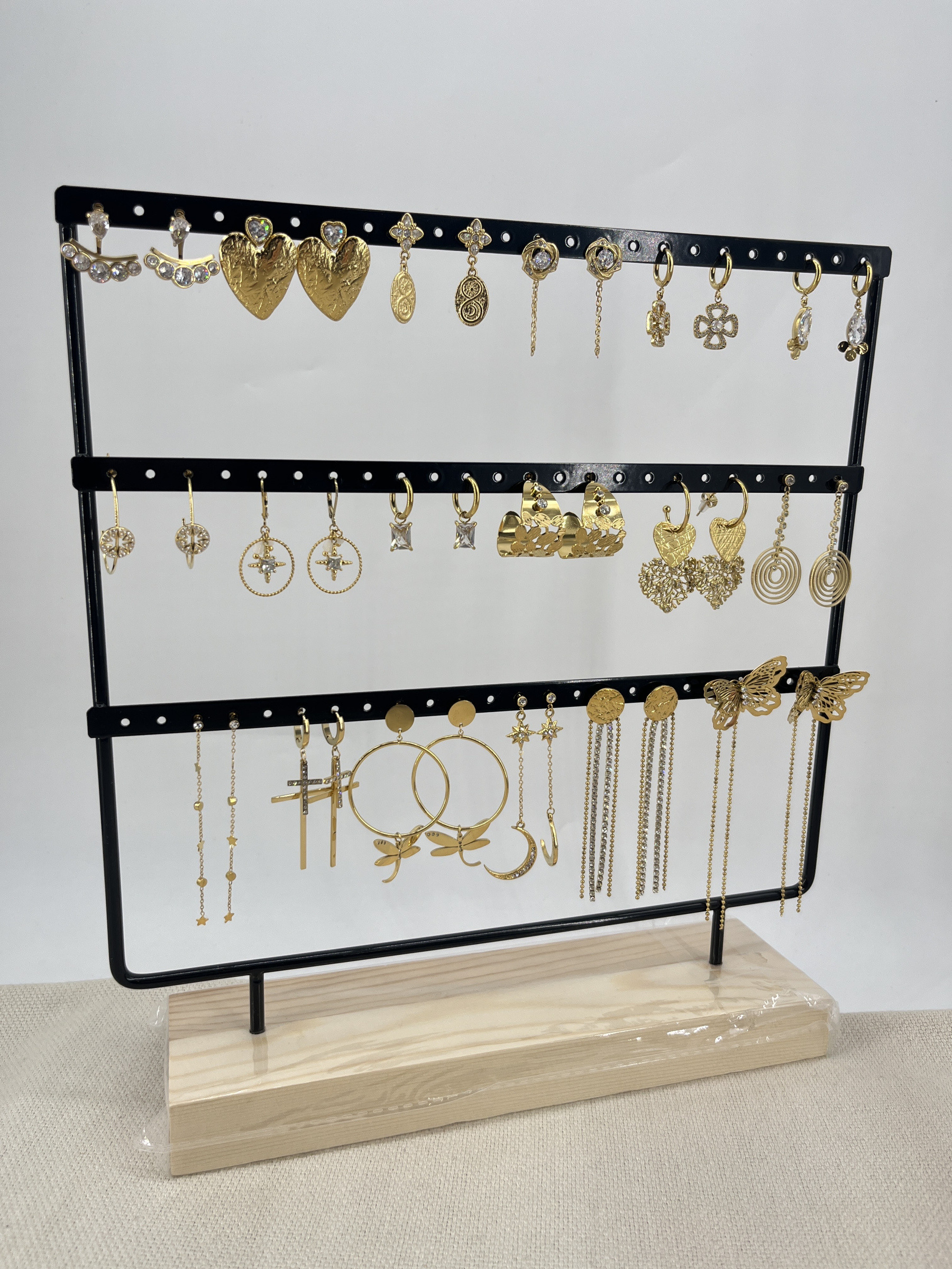 Grossiste Missra Paris - LOT 18 BOUCLES D'OREILLES EN ACIER+PRESENTOIR EN BOIS