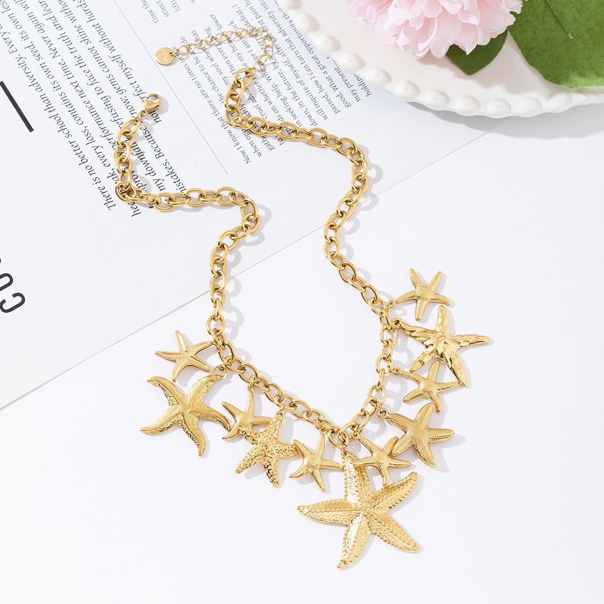 Grossiste Mochimo Suonana - Collier avec breloques étoiles de mer en acier inoxydable