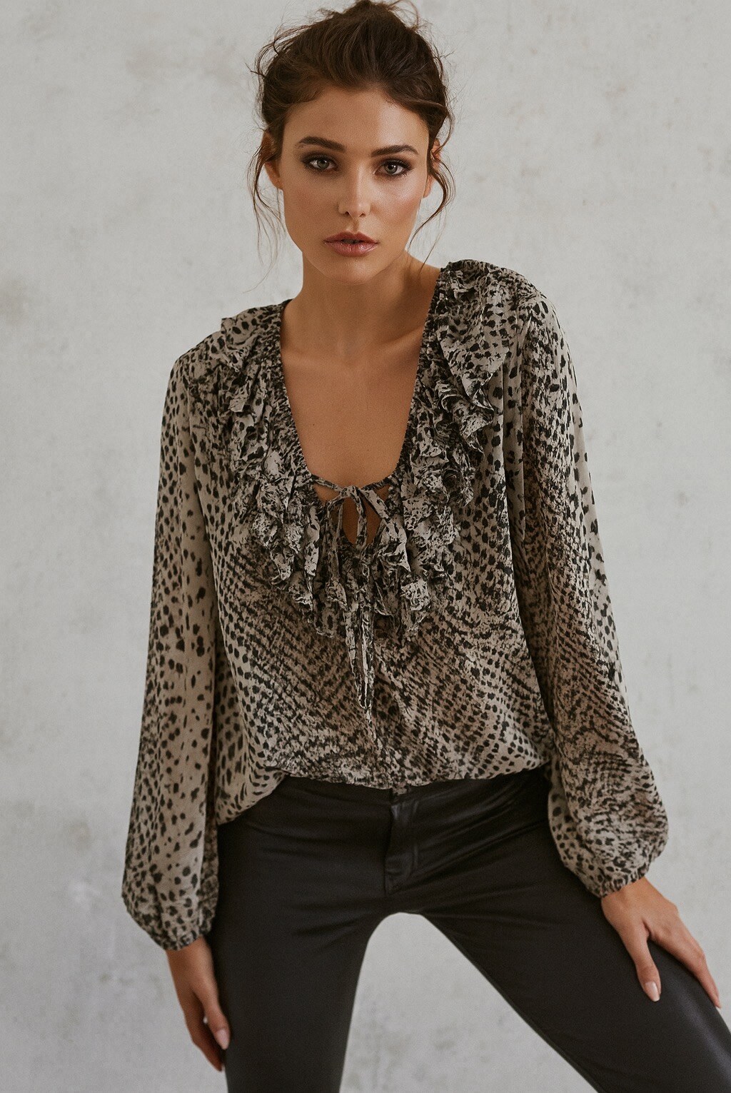 Flowy python print blouse with ruffles and a tie at the neckline ...