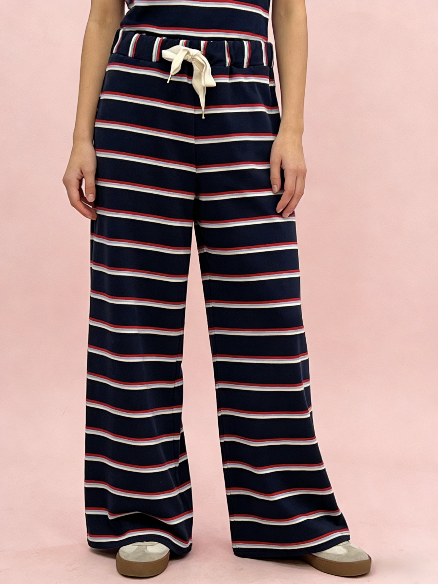 Mayorista MONDIAL FASHION - Pantalón a rayas con cordón y bolsillos
