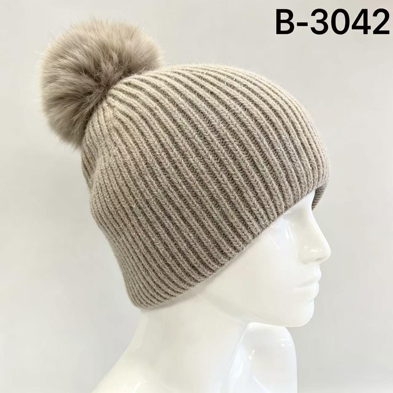Wholesaler MONTE ALPI - KNIT HAT WITH VERTICAL RIBS WITHOUT FOLDED EDGE, FAUX FUR POM-POM, AND DELICATE GLITTER