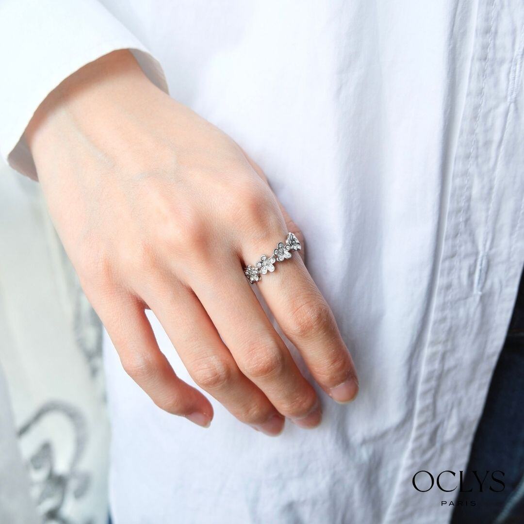 Grossista OCLYS - Anello fiore Ovia in acciaio inossidabile con strass argento