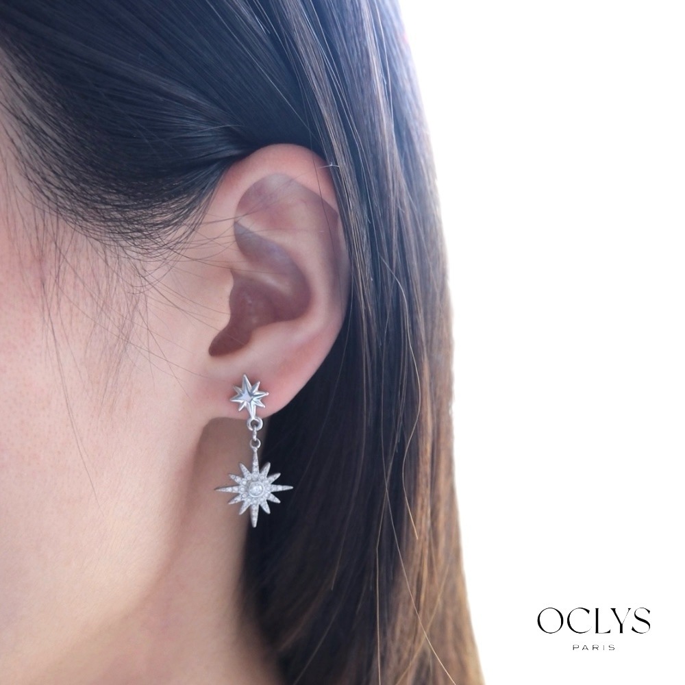 Grossiste OCLYS - Boucles d'oreilles pendantes étoile strass acier inoxydable Naria argent