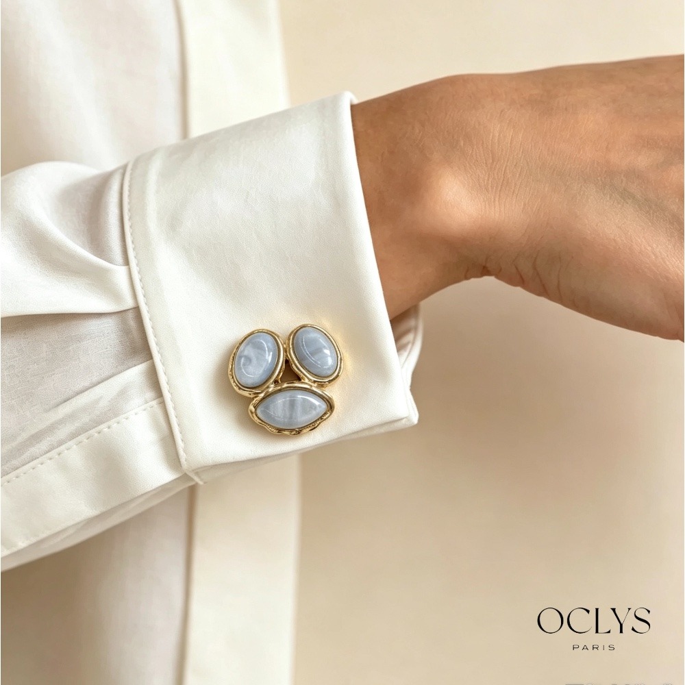 Grossiste OCLYS - Paire de cache-boutons résine acier inoxydable doré Mia