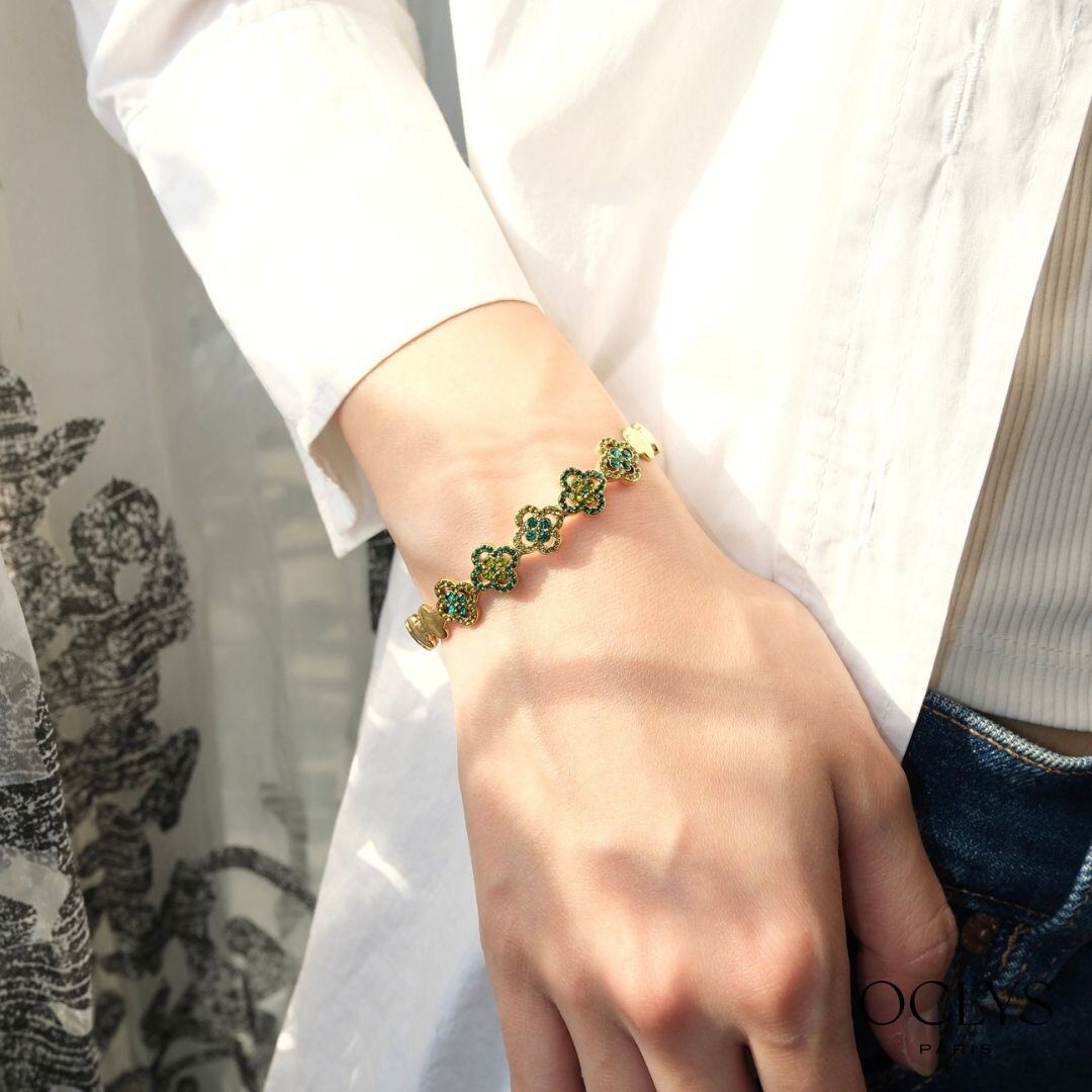 Grossista OCLYS - Bracciale a polsino Foki in acciaio inossidabile dorato con strass a forma di fiore