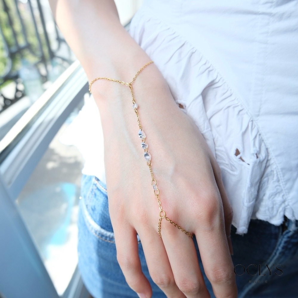 Mayorista OCLYS - Joya de mano de acero inoxidable dorado con strass Uki