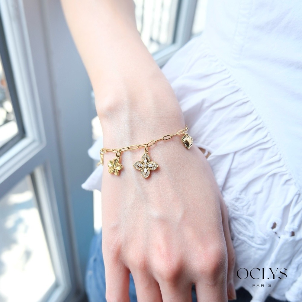 Grossiste OCLYS - Bracelet breloques fleur strass acier inoxydable doré Nina