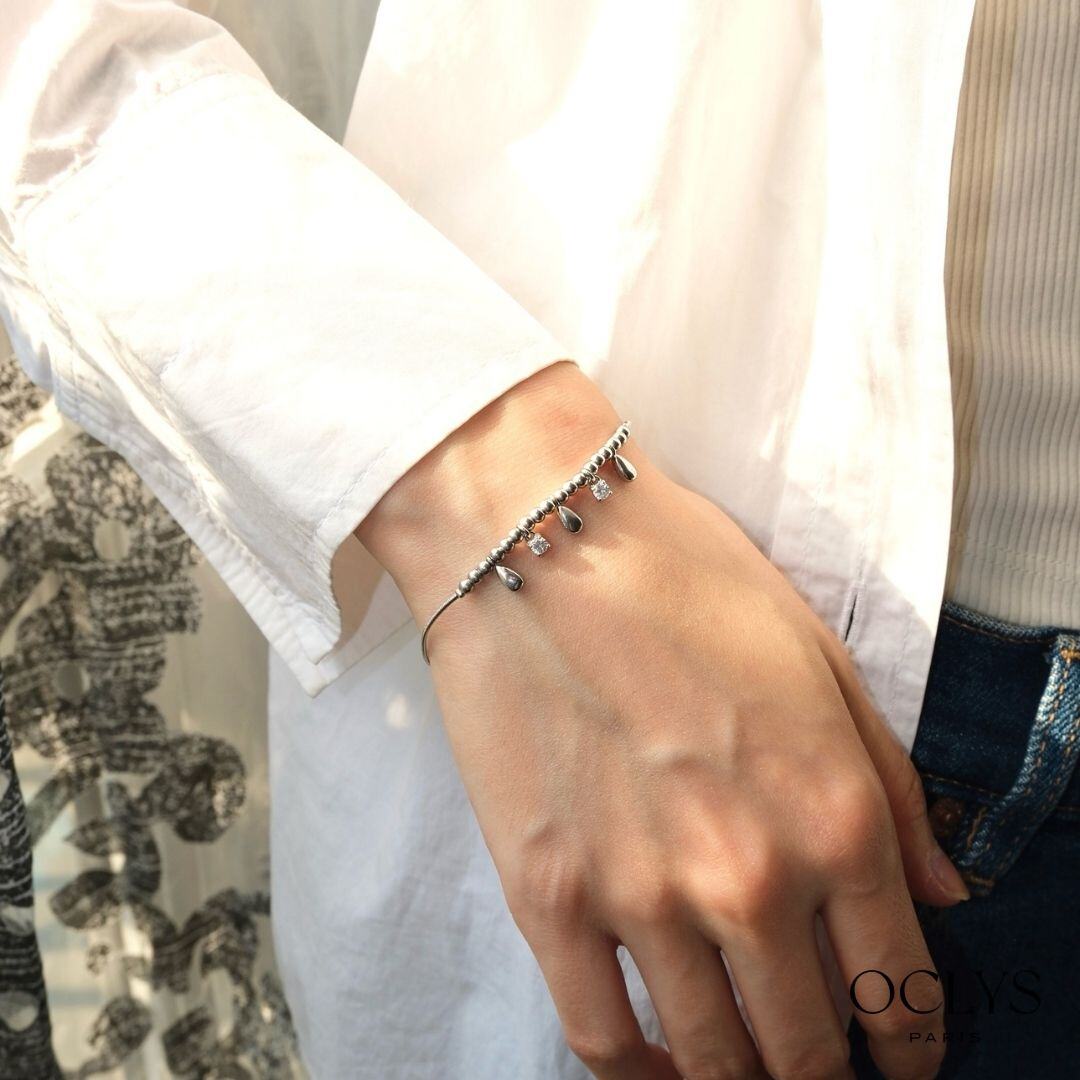 Grossista OCLYS - Bracciale con ciondoli Pona in acciaio inossidabile argento con strass