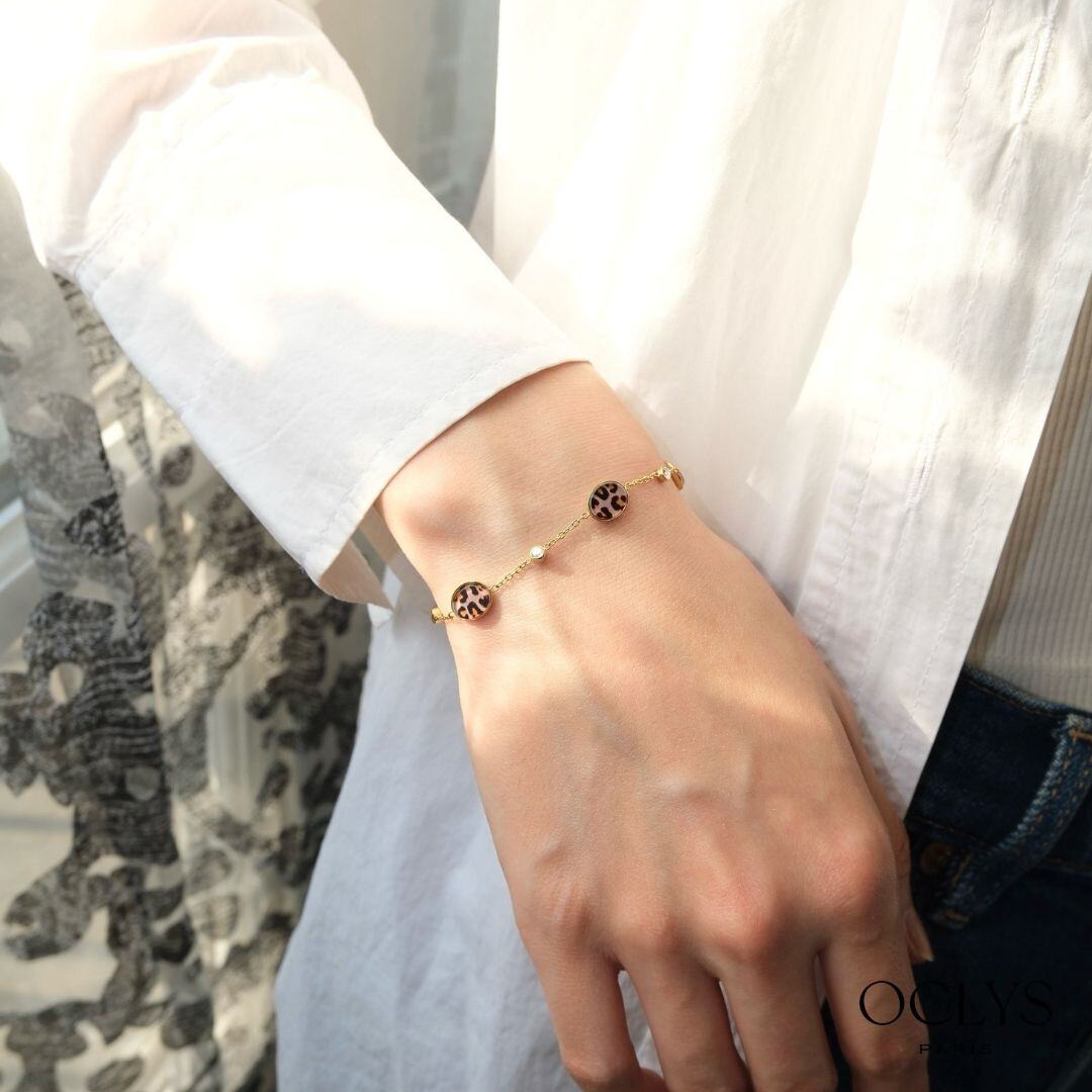 Grossista OCLYS - Bracciale sottile leopardato con strass in acciaio inox dorato Noa