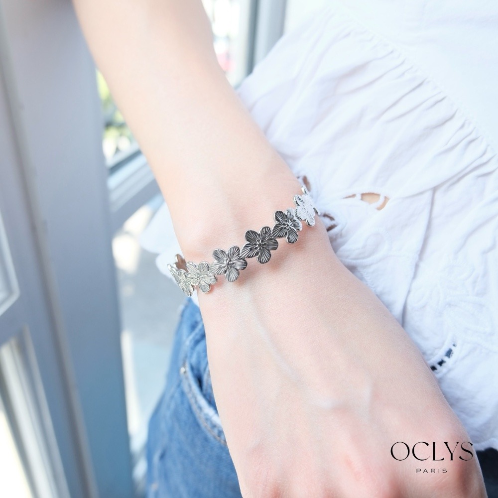 Mayorista OCLYS - Brazalete de puño floral Ella de acero inoxidable plateado