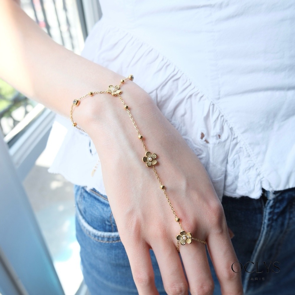 Mayorista OCLYS - Joya de mano con esferas de flores con cuentas en acero inoxidable dorado Kina