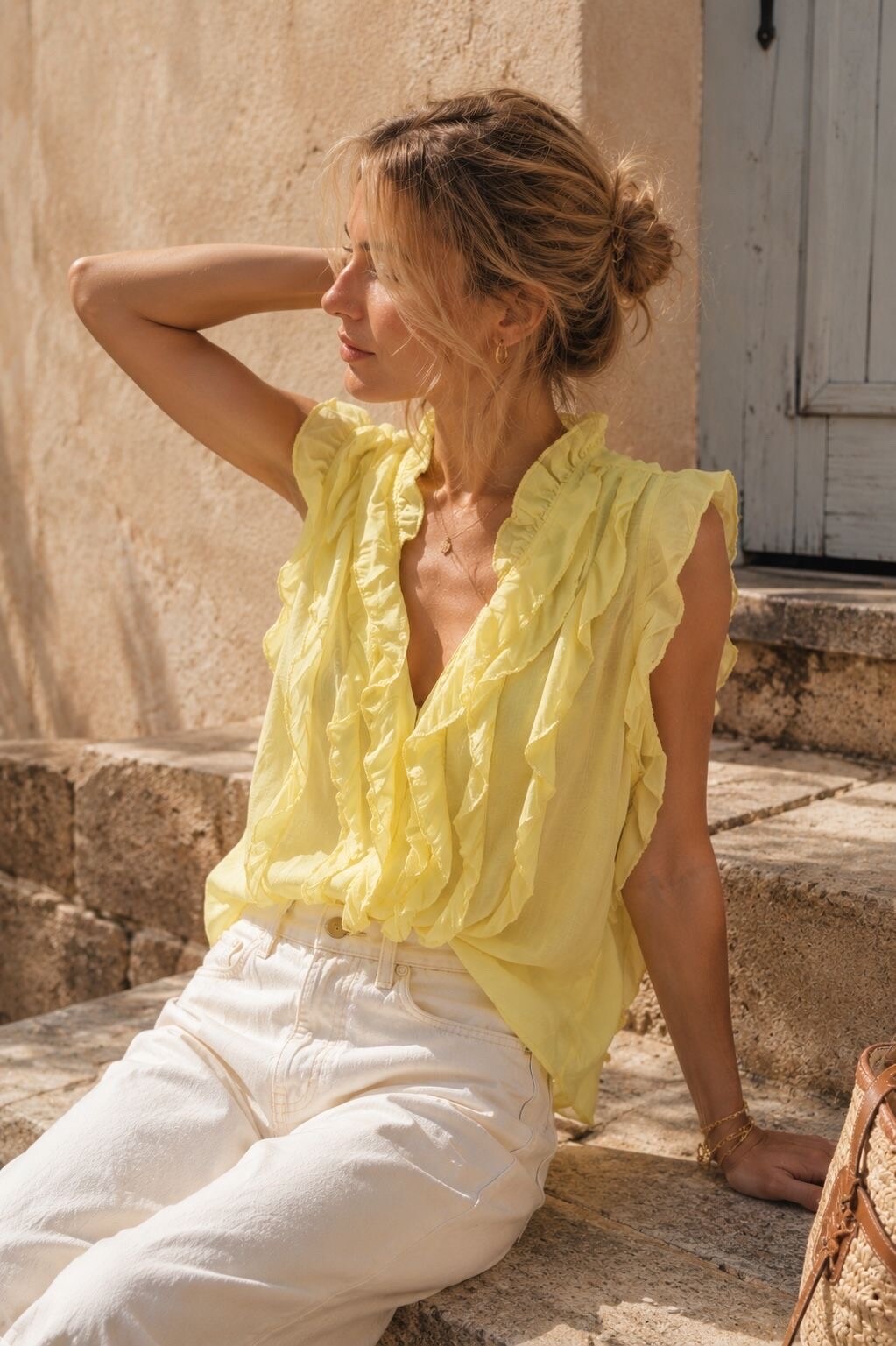 Grossista Orice - Blusa senza maniche con volant