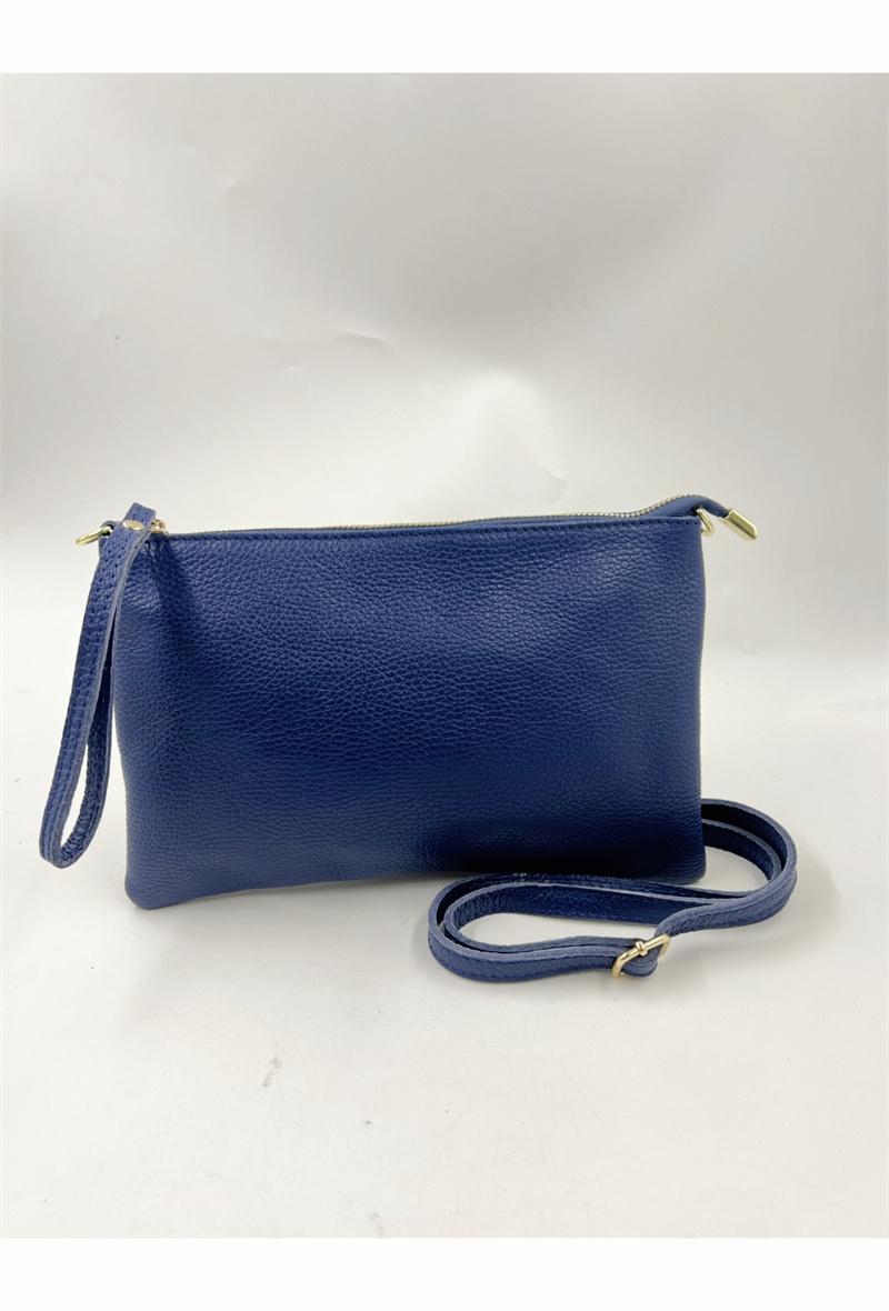 Großhändler ORIENT&CO - Gürteltasche aus glänzendem Leder mit Schultergurt