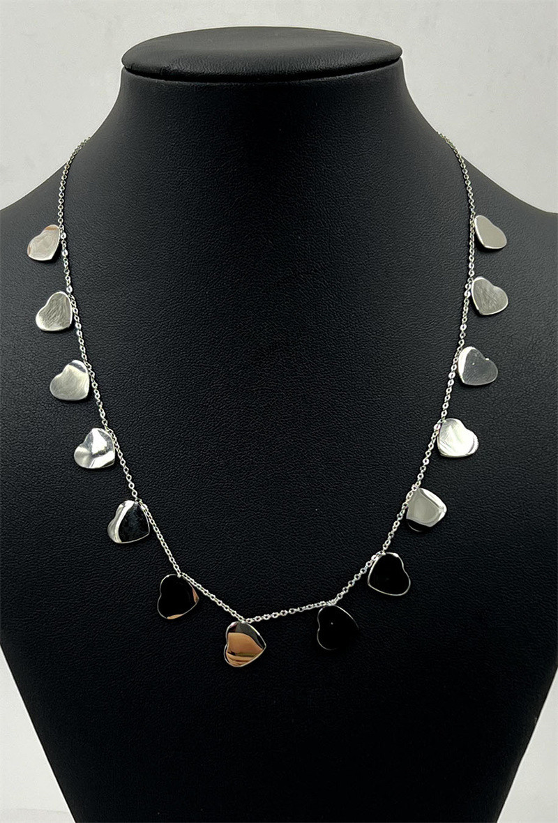 Grossiste ORIENT EXPRESS FIRST - Collier croix en acier inoxydable