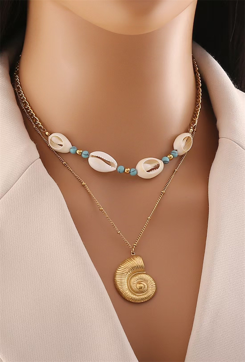 Grossiste ORIENT EXPRESS FIRST - COLLIER  EN ACIER INOXYDA  COQUILLES