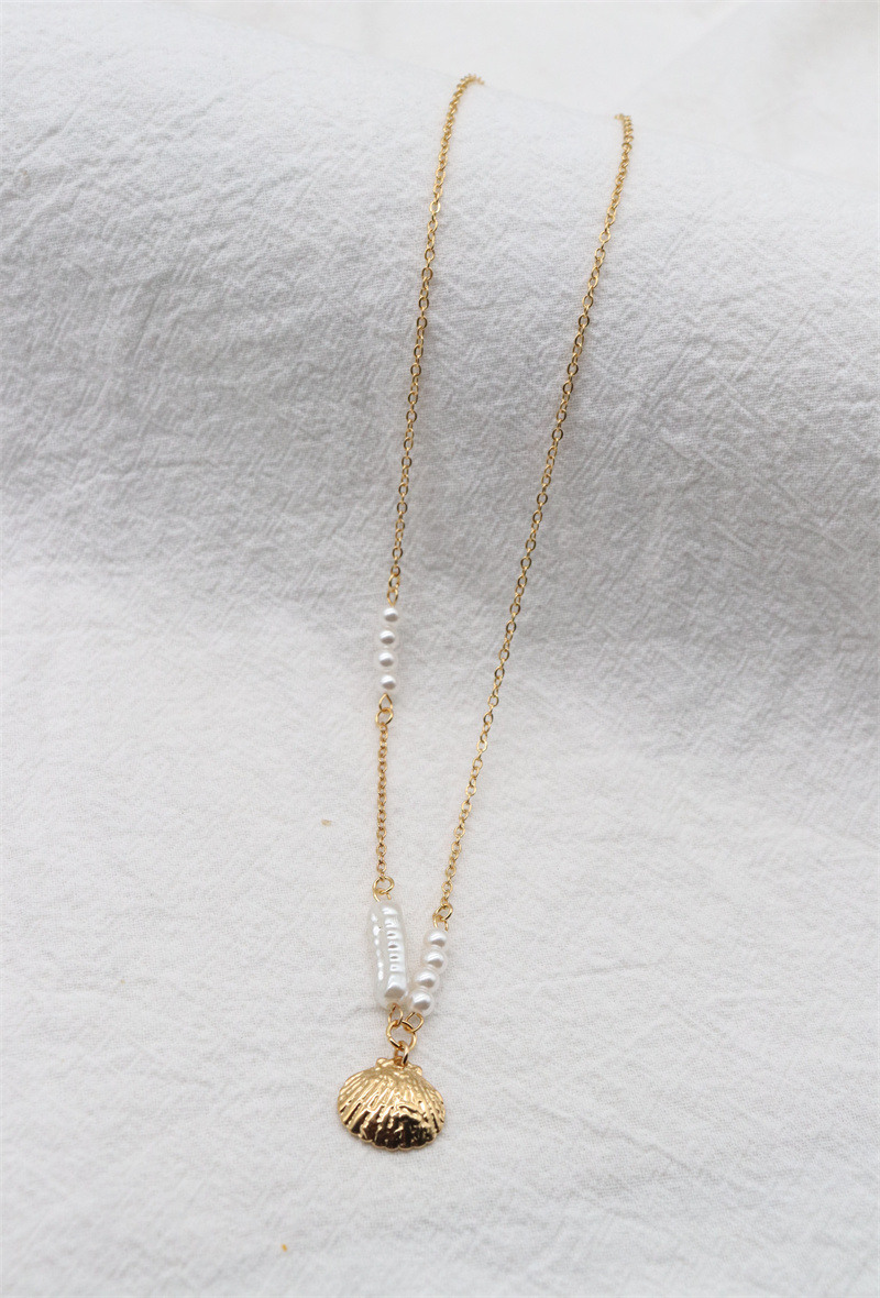Grossiste ORIENT EXPRESS FIRST - COLLIER  EN ACIER INOXYDA PERLES COQUILLES