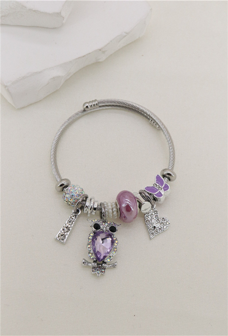 Mayorista Orient Express - Pulsera adornada con dije de metal