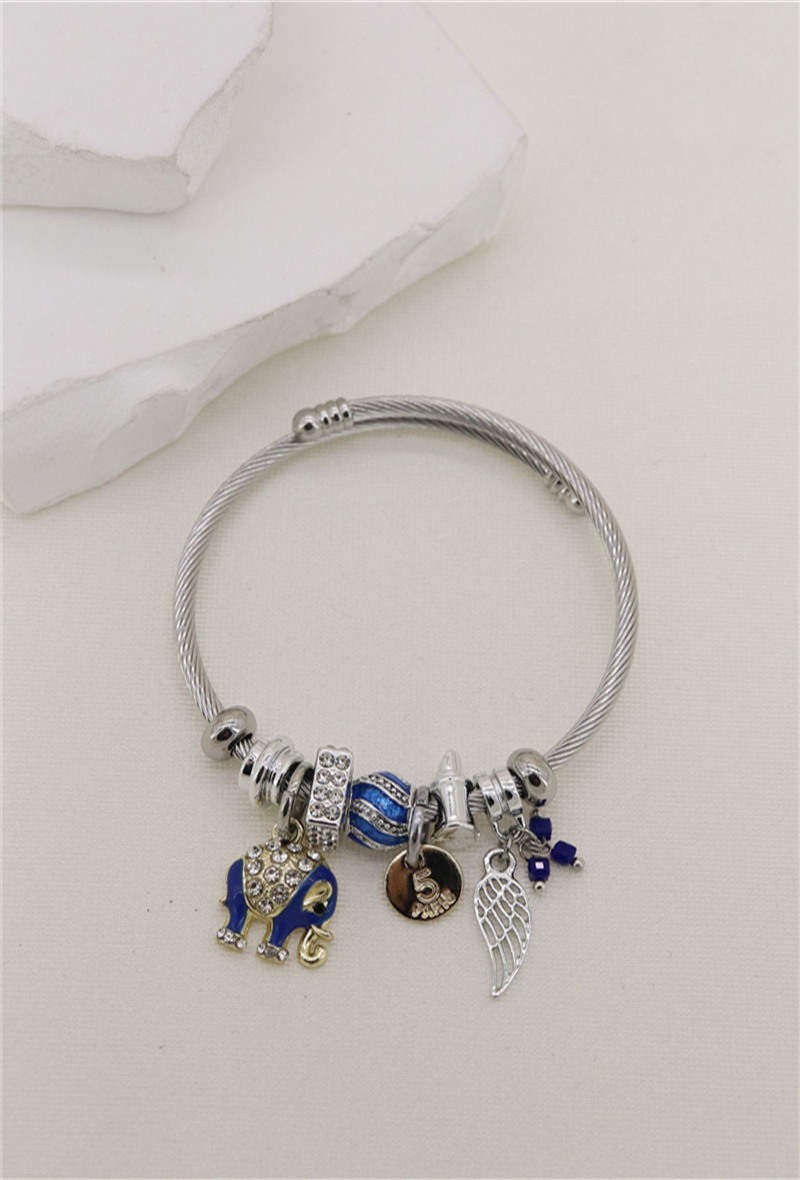 Mayorista Orient Express - Pulsera adornada con dije de metal