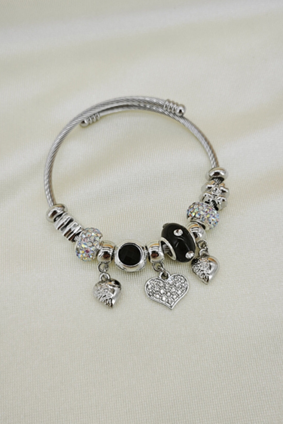Mayorista Orient Express - Pulsera adornada con dije de metal