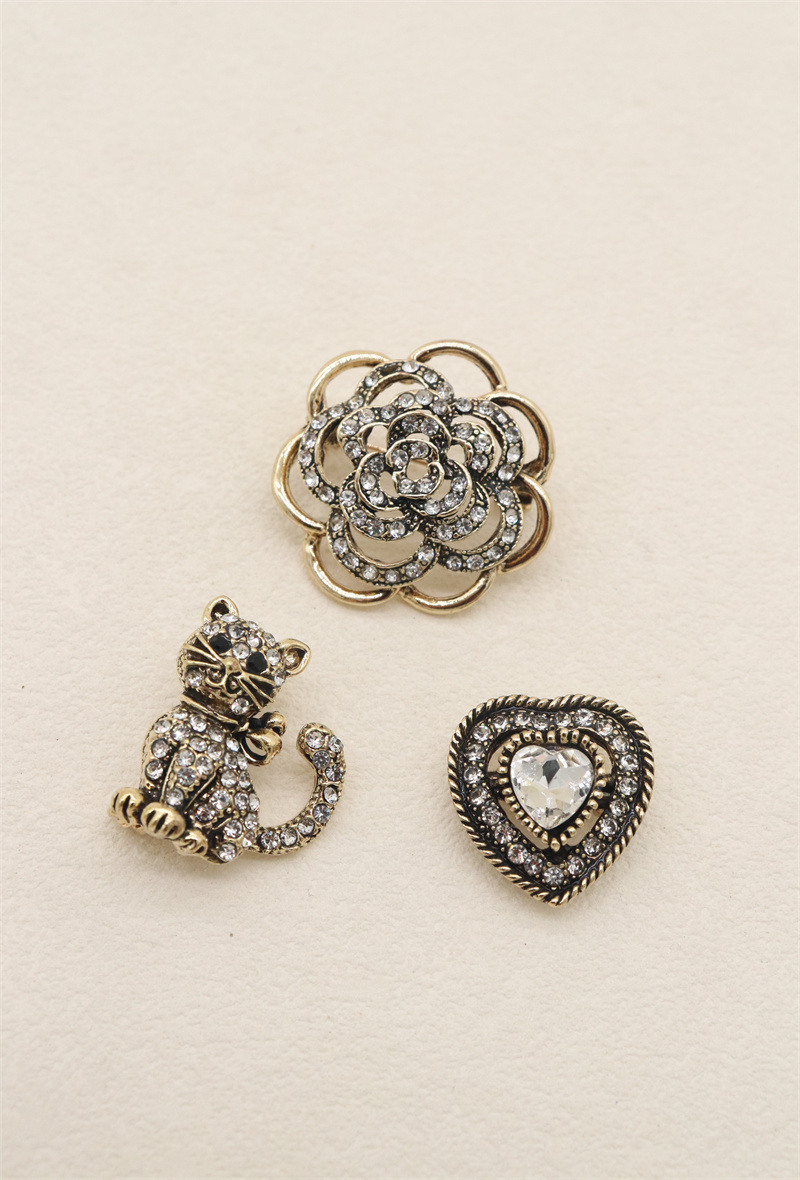 Grossista Orient Express - Set di 3 spille in metallo e strass