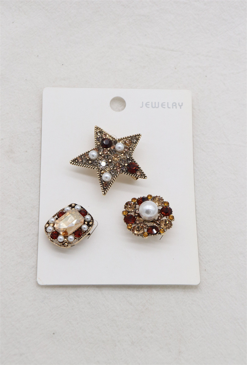 Grossista Orient Express - Set di 3 spille in metallo e strass