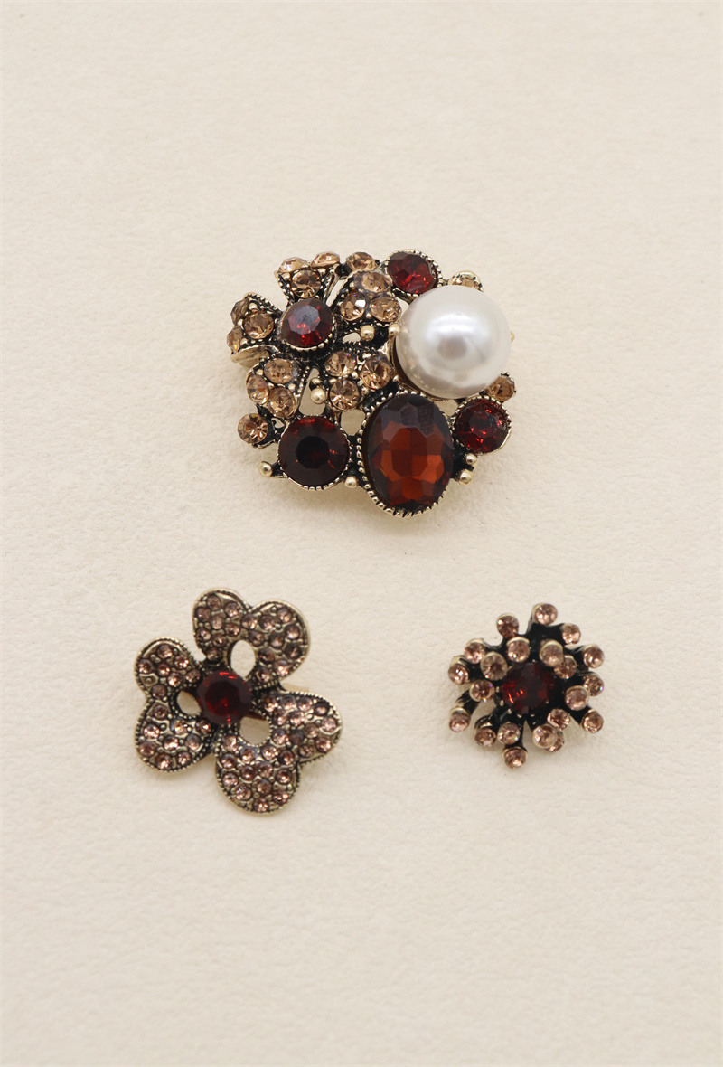 Grossista Orient Express - Set di 3 spille in metallo e strass