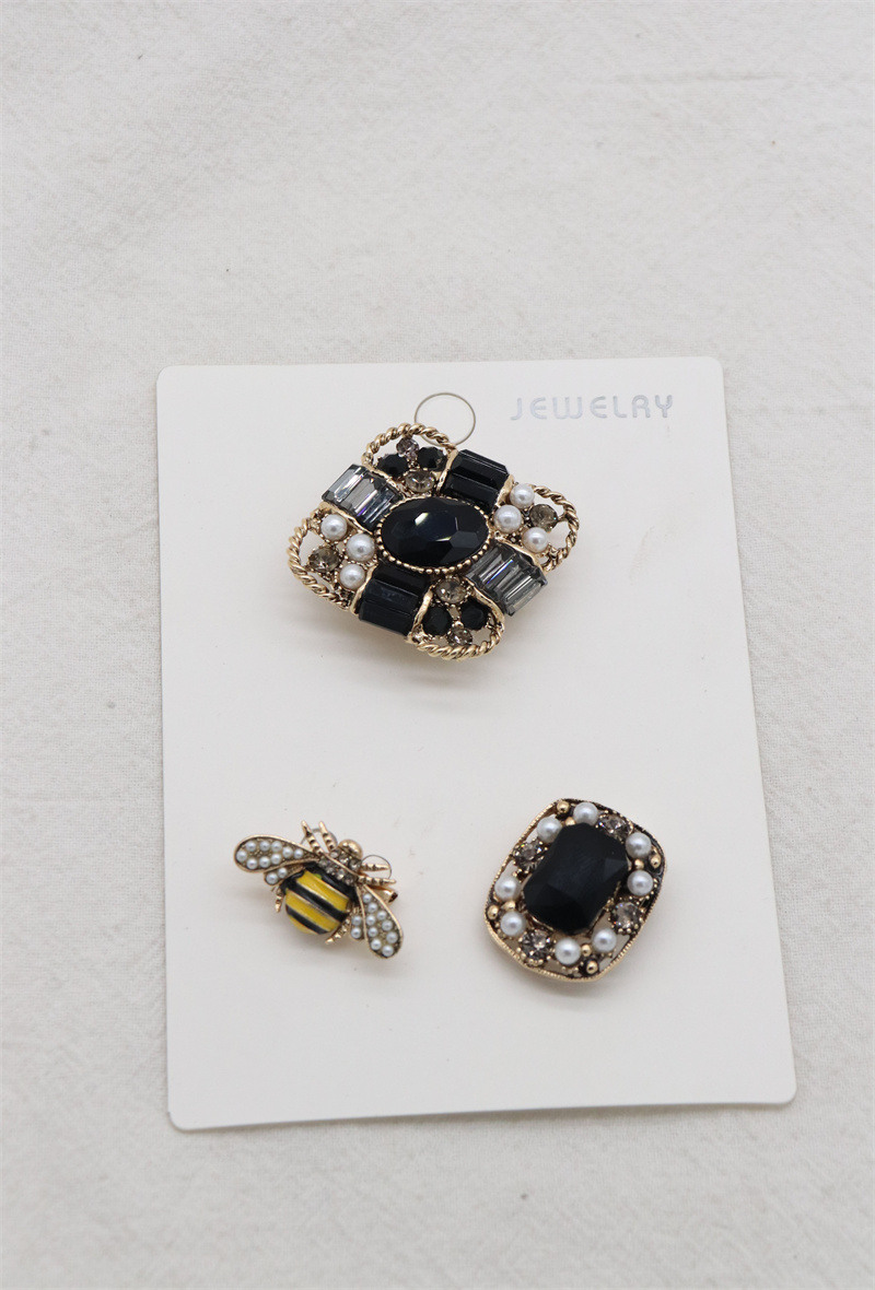 Grossista Orient Express - Set di 3 spille in metallo e strass