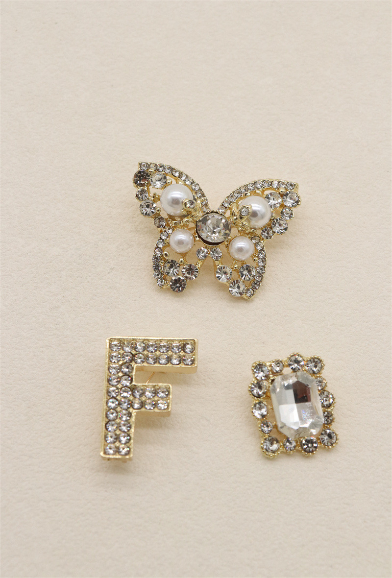 Grossista Orient Express - Set di 3 spille in metallo e strass