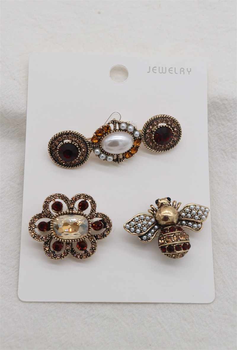Grossista Orient Express - Set di 3 spille in metallo e strass