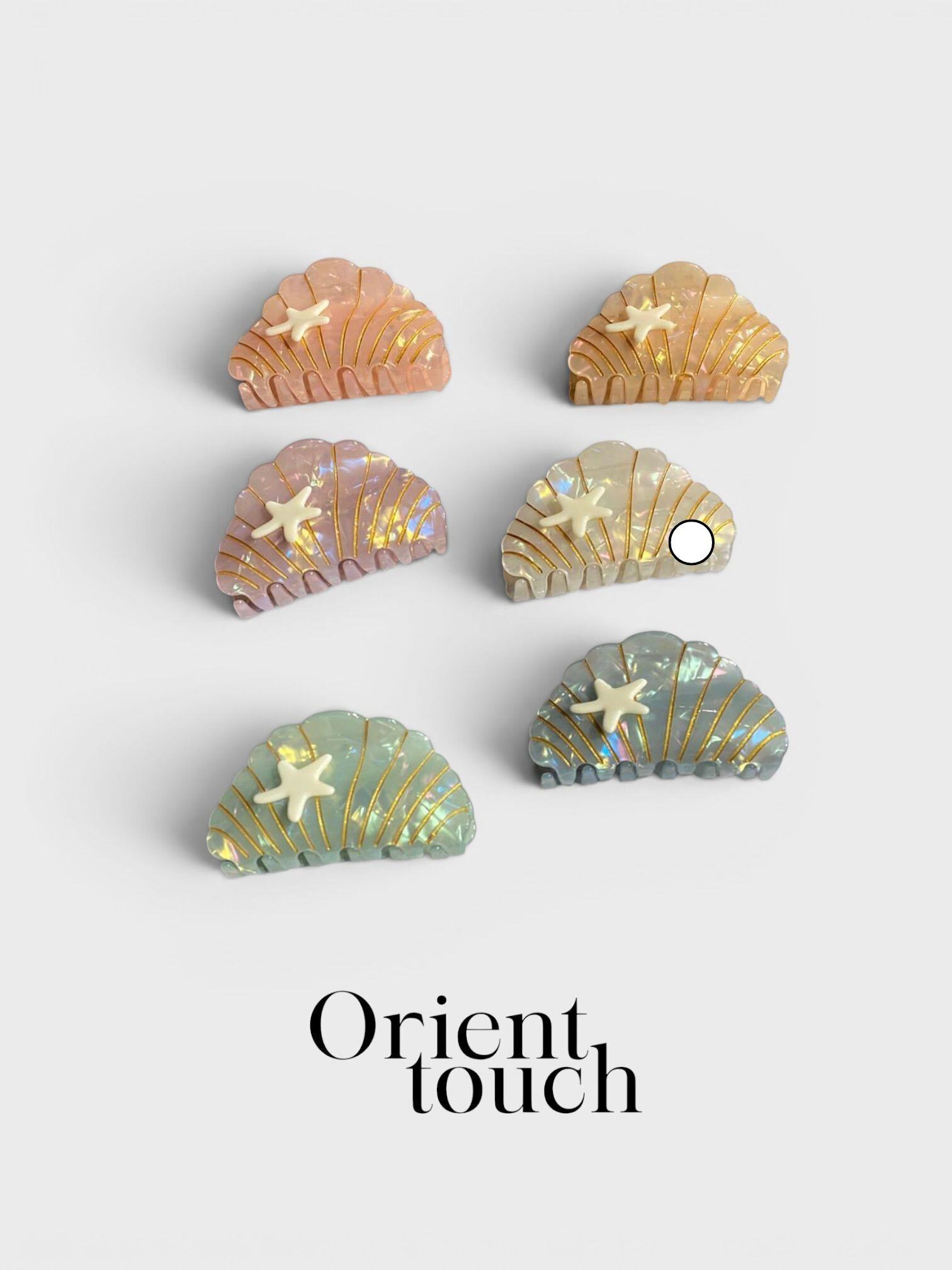 Grossiste ORIENT TOUCH - PINCES COQUILLAGE