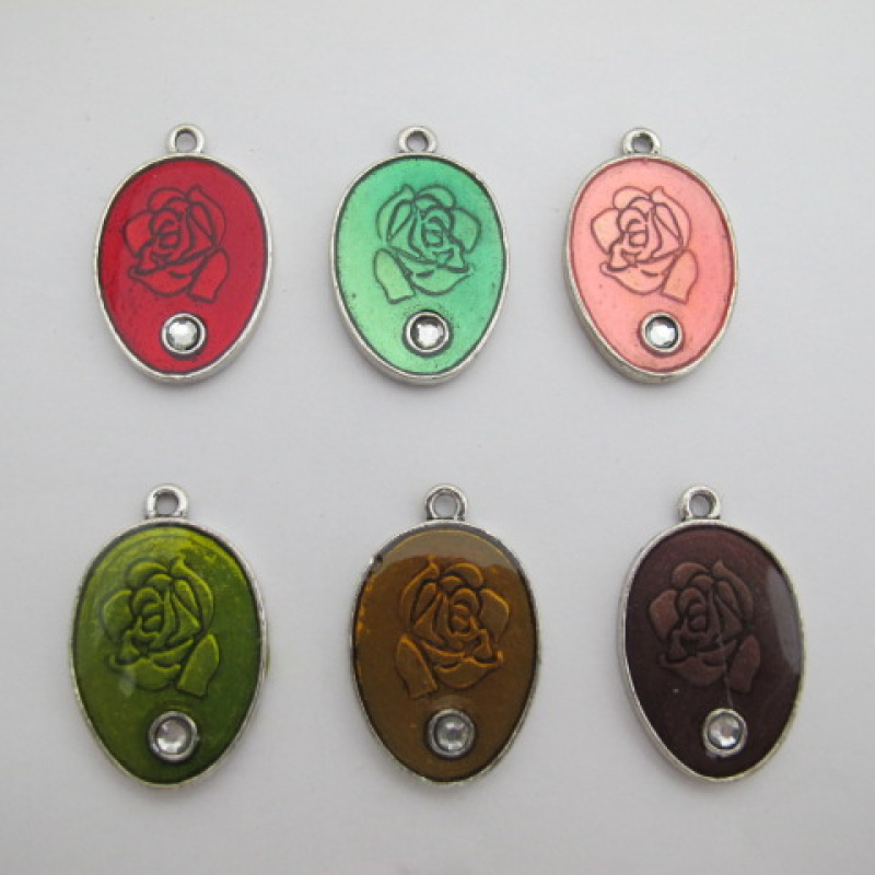 Mayorista PERLES BLEUES - 10 Colgantes ovalados con pedrería en metal esmaltado por ambas caras 22x34mm