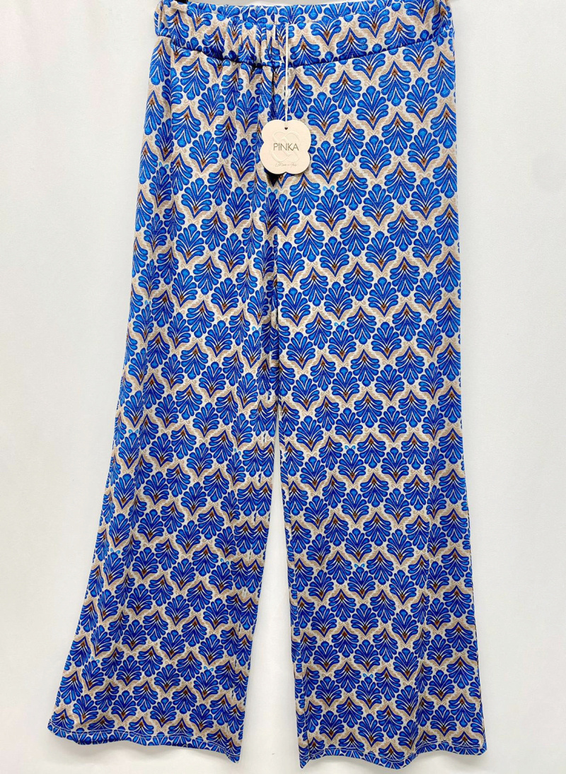 Mayorista PINKA - Pantalón estampado con hilos plateados.