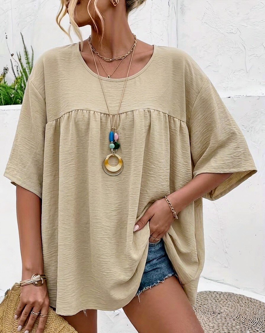 Grossista RZ Fashion - Blusa girocollo con collana. La taglia grande corrisponde da 40 a 52