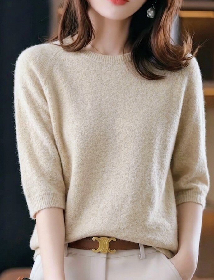 Grossiste RZ Fashion - Pull élégante à col rond avec Demi manches. Taille correspond 38 à 42