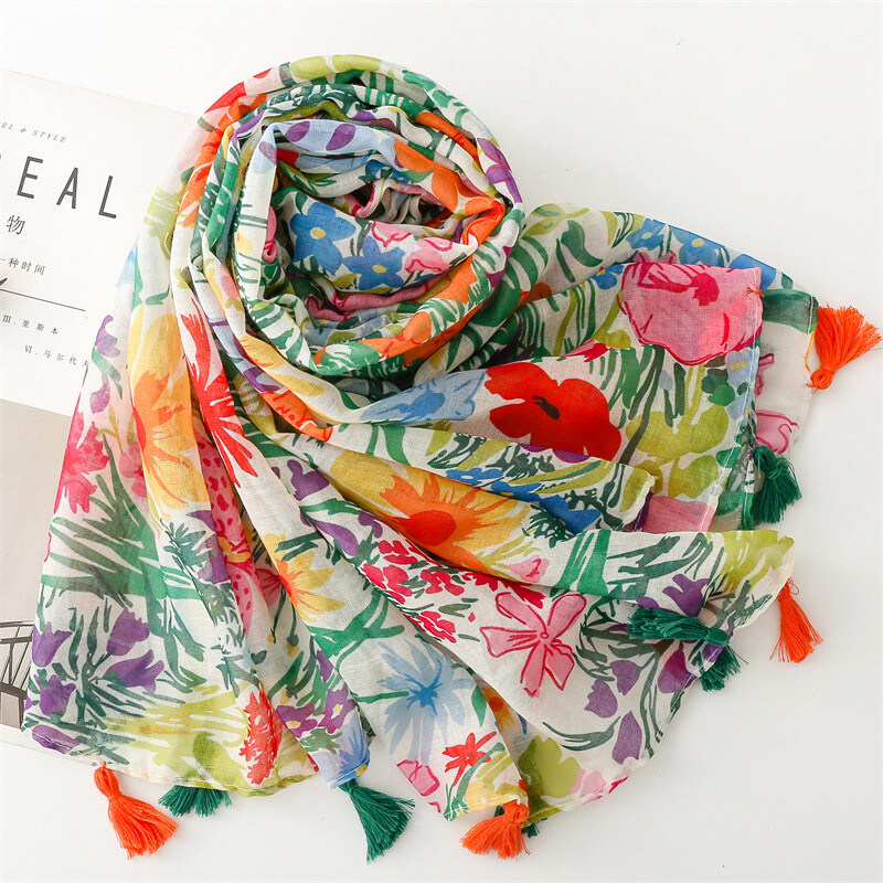 Grossista Sandy Paris - Foulard stampato con nappine