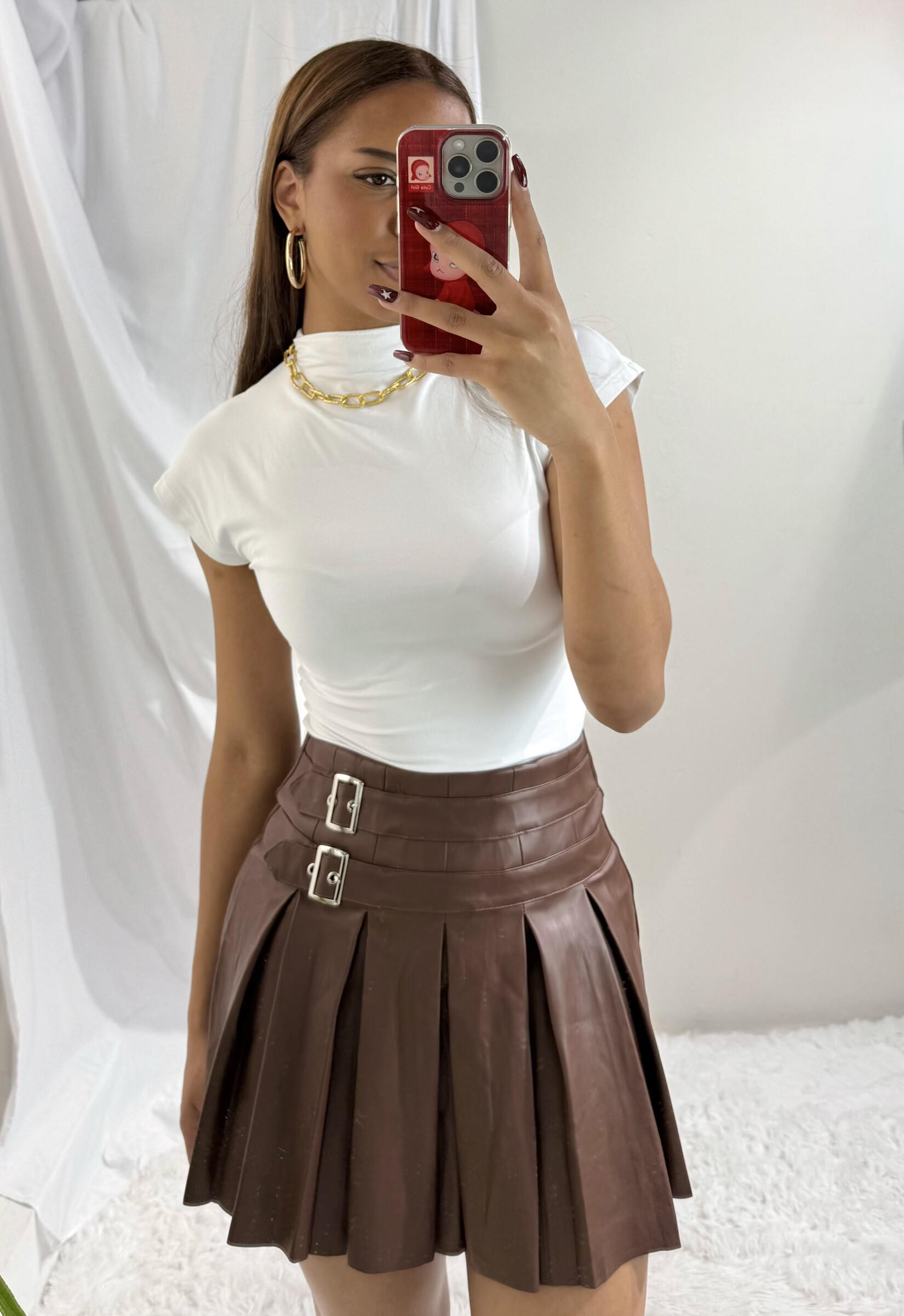 Grossiste Soy & Co - jupe similicuir plissée avec boucles décoratives
