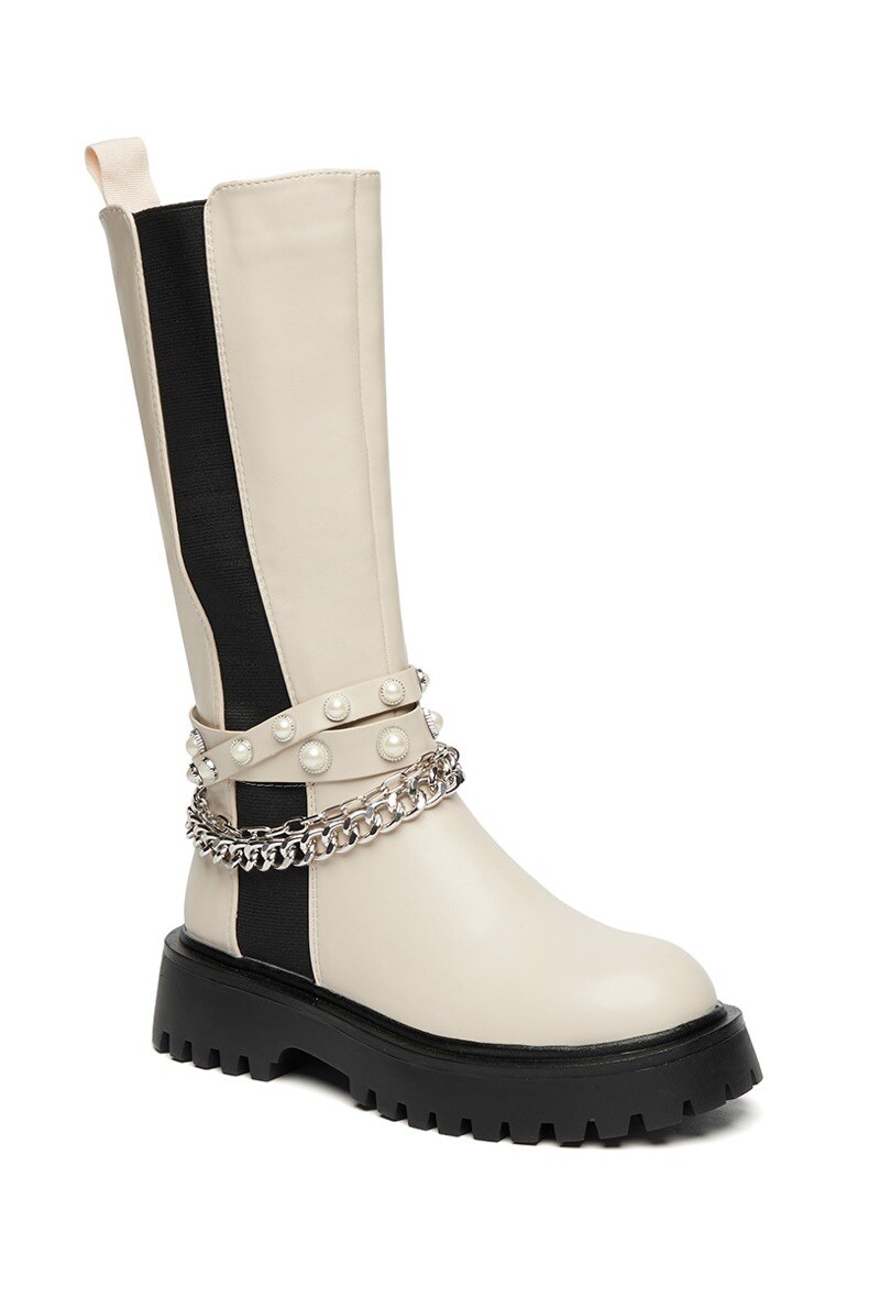 Großhändler Stephan Paris - Hoher Stiefel mit elastischem Schaft und Ketten- und Perlenverzierung