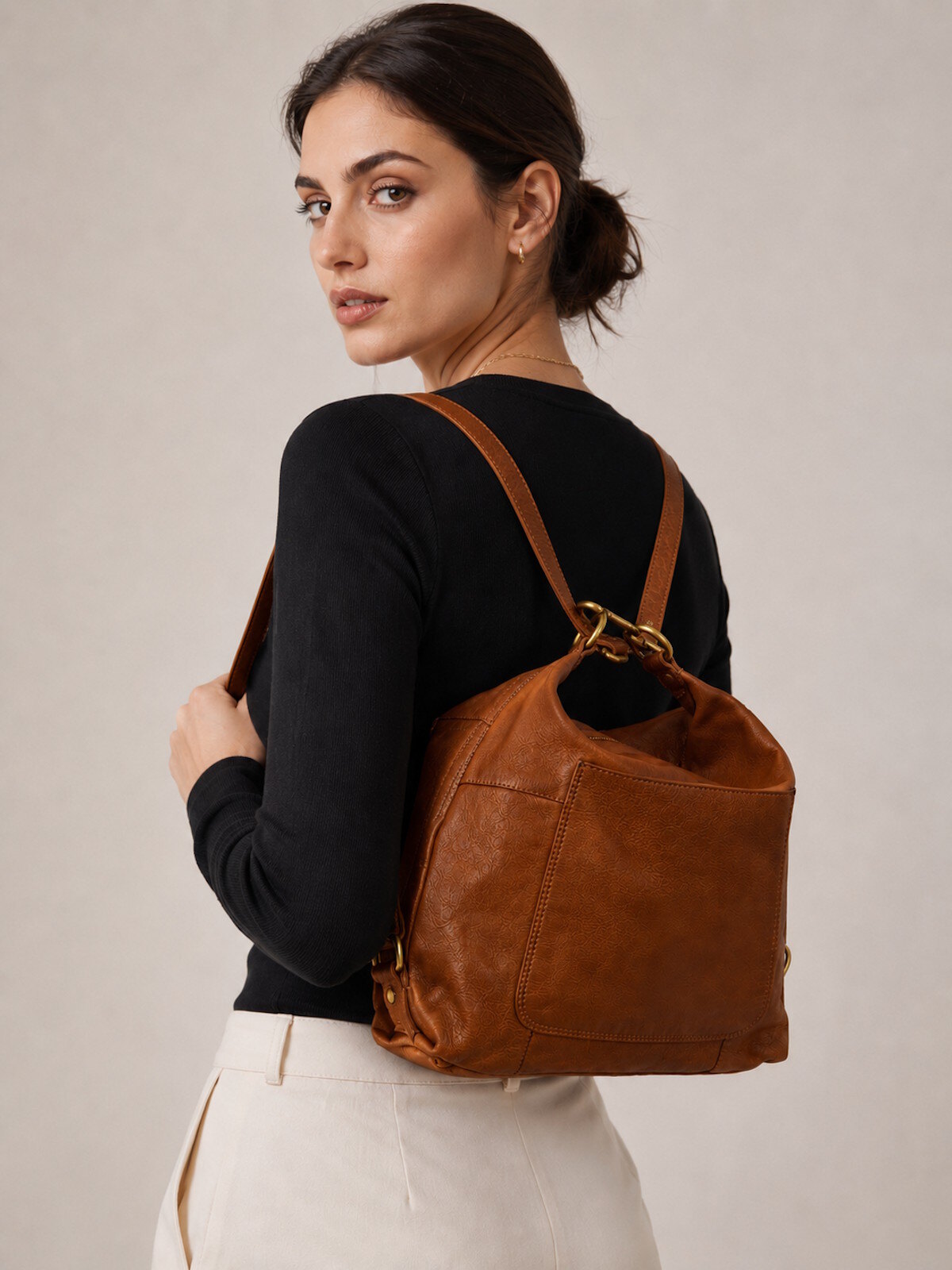 Mayorista Suie Valentini - Mochila Convertible de Cuero Auténtico