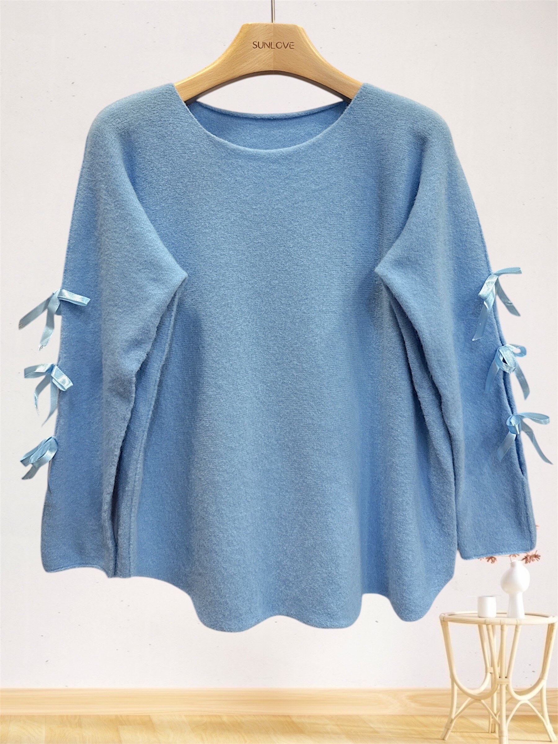 Pull en laine et alpaga, manches dénudées avec nœud, idéal pour le printemps, fabriqué en Italie.