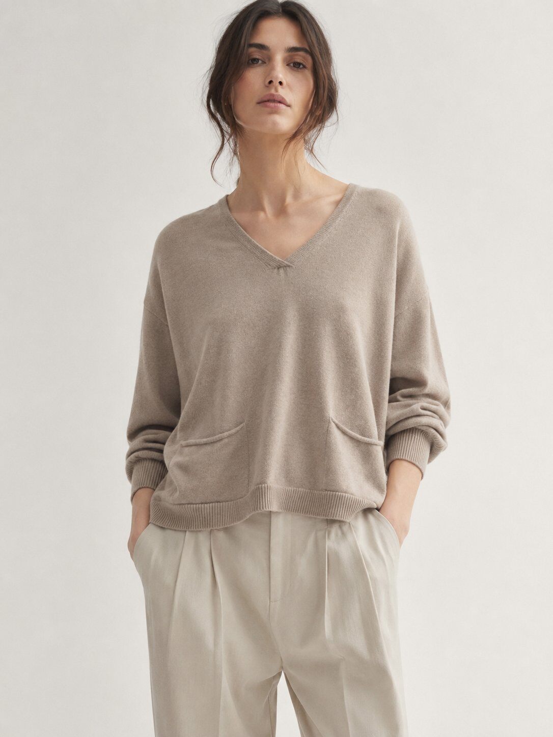 Mayorista Sunny Knit - Suéter de punto con cuello en V relajado para mujer con bolsillos delanteros