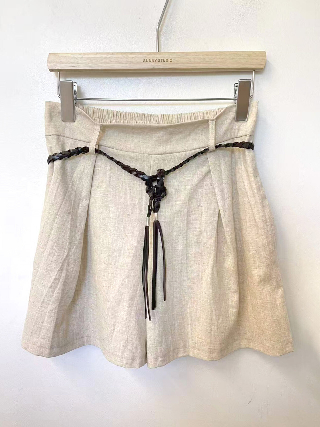 Grossista Sunny Studio - Shorts da donna con cintura intrecciata