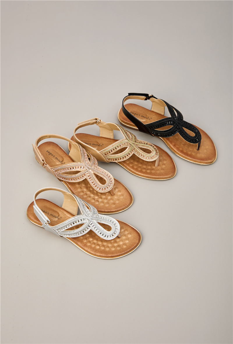 Wholesaler Super Mode | Belle Women - Toe-post sandals with a massaging sole, rhinestone strap, and pattern