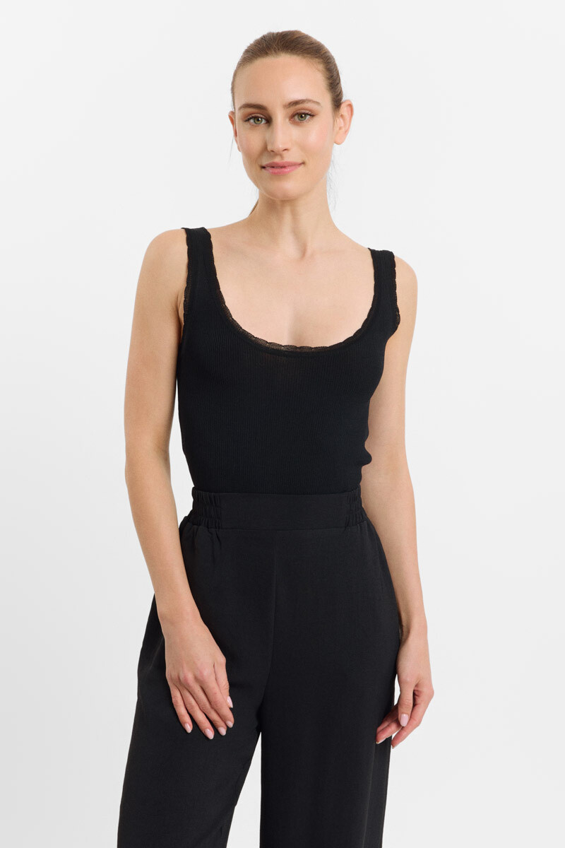 Top en maille léger, 80% viscose, 20% polyester, idéal pour le printemps-été, fabriqué en Chine.