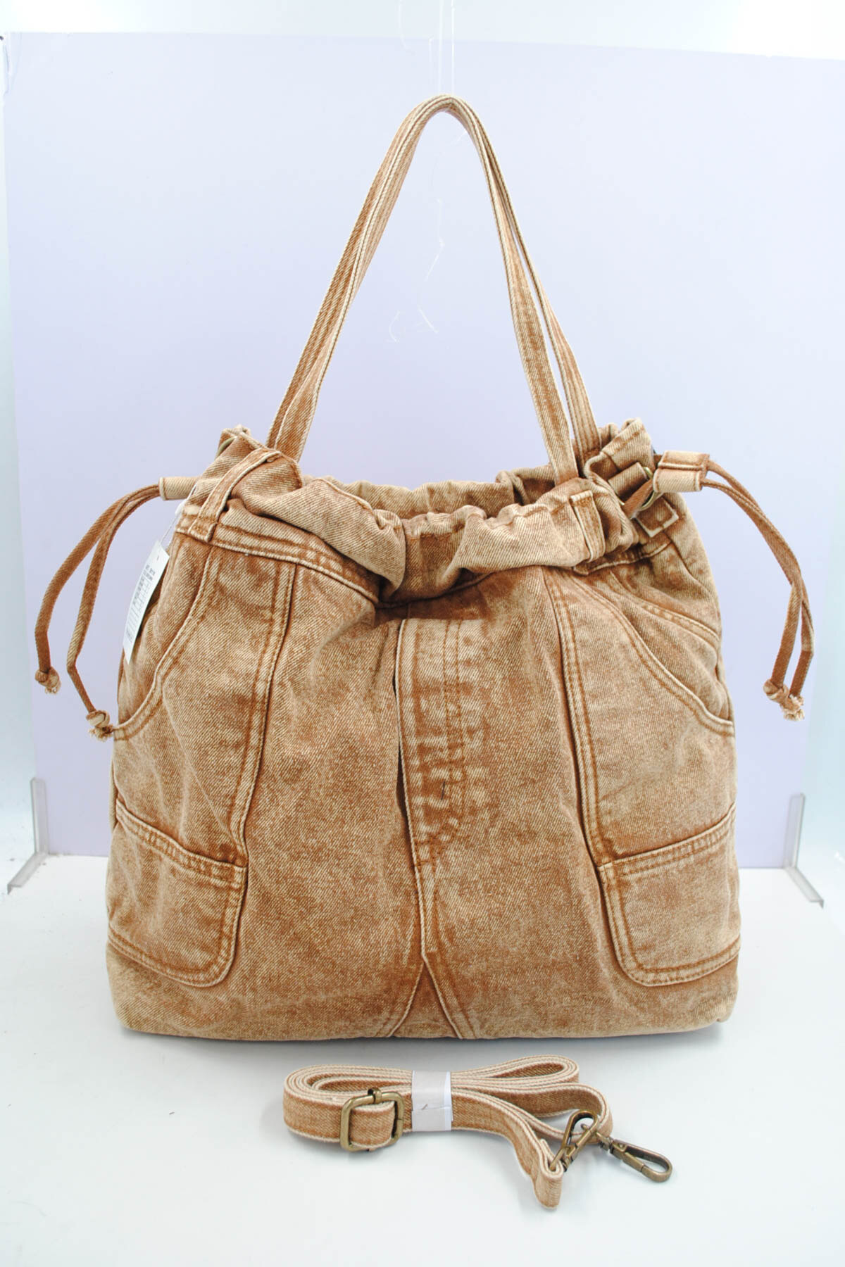 Grossiste SyStyle - Sac à cordon en jean délavé vintage, bandoulière longue croisée fournie, sac grand volume multi-poches pour tous les jours, 6 coloris disponibles