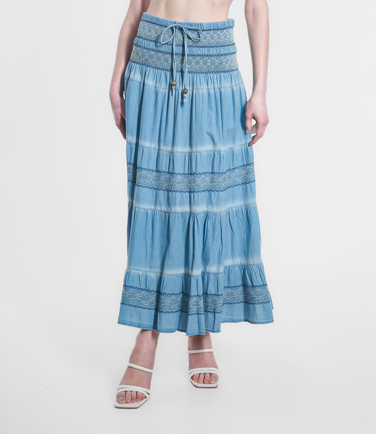 Grossista TDI FASHION - Gonna lunga effetto denim con vita smock e ricami