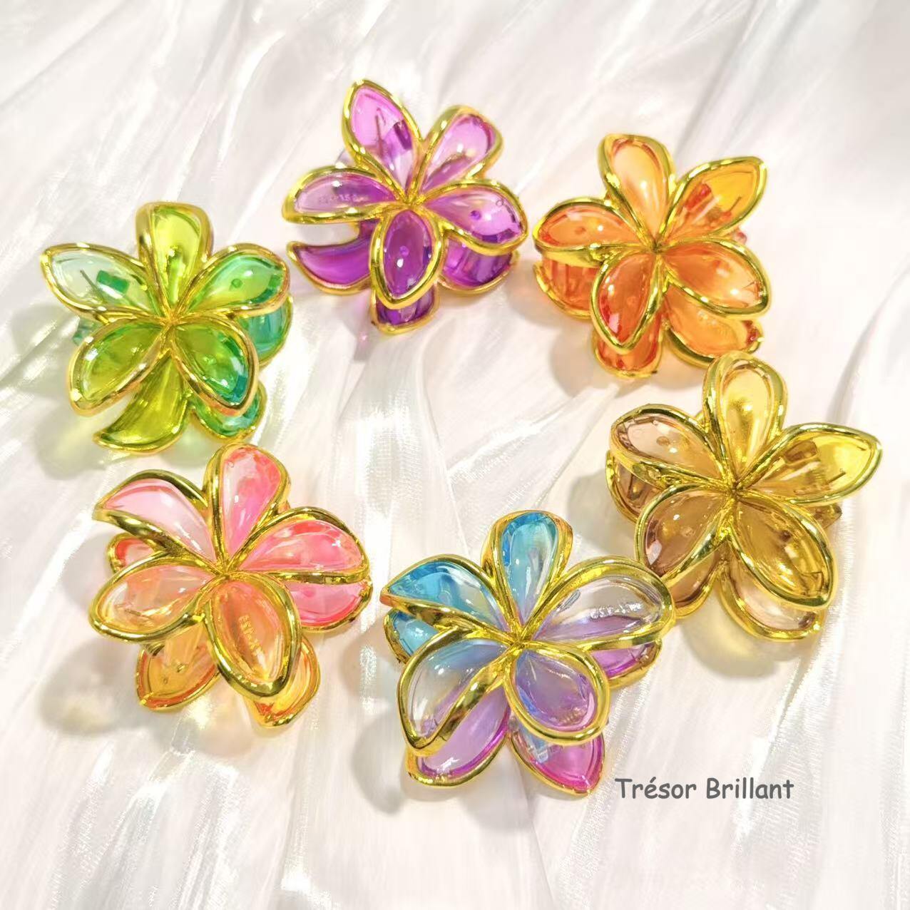 Großhändler Trésor Brillant - Satz von 12 Goldene Kunststoff-Blumen-Haarspangen 6cm
