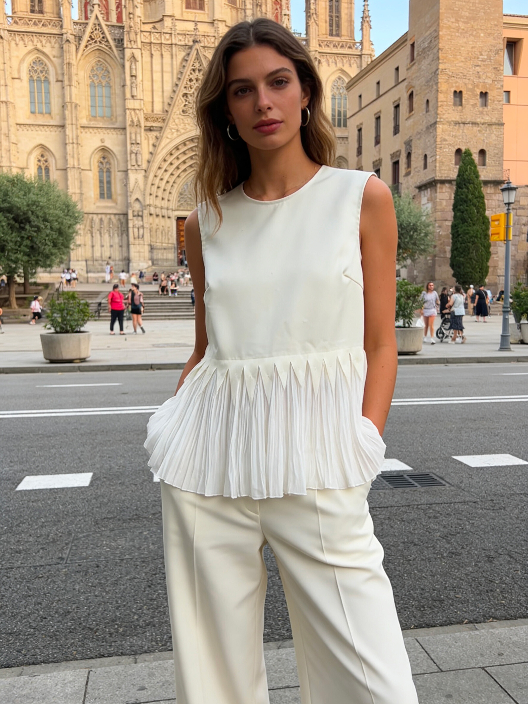 Wholesaler V&L BRAND - Sleeveless top with pleated peplum hem silk effect