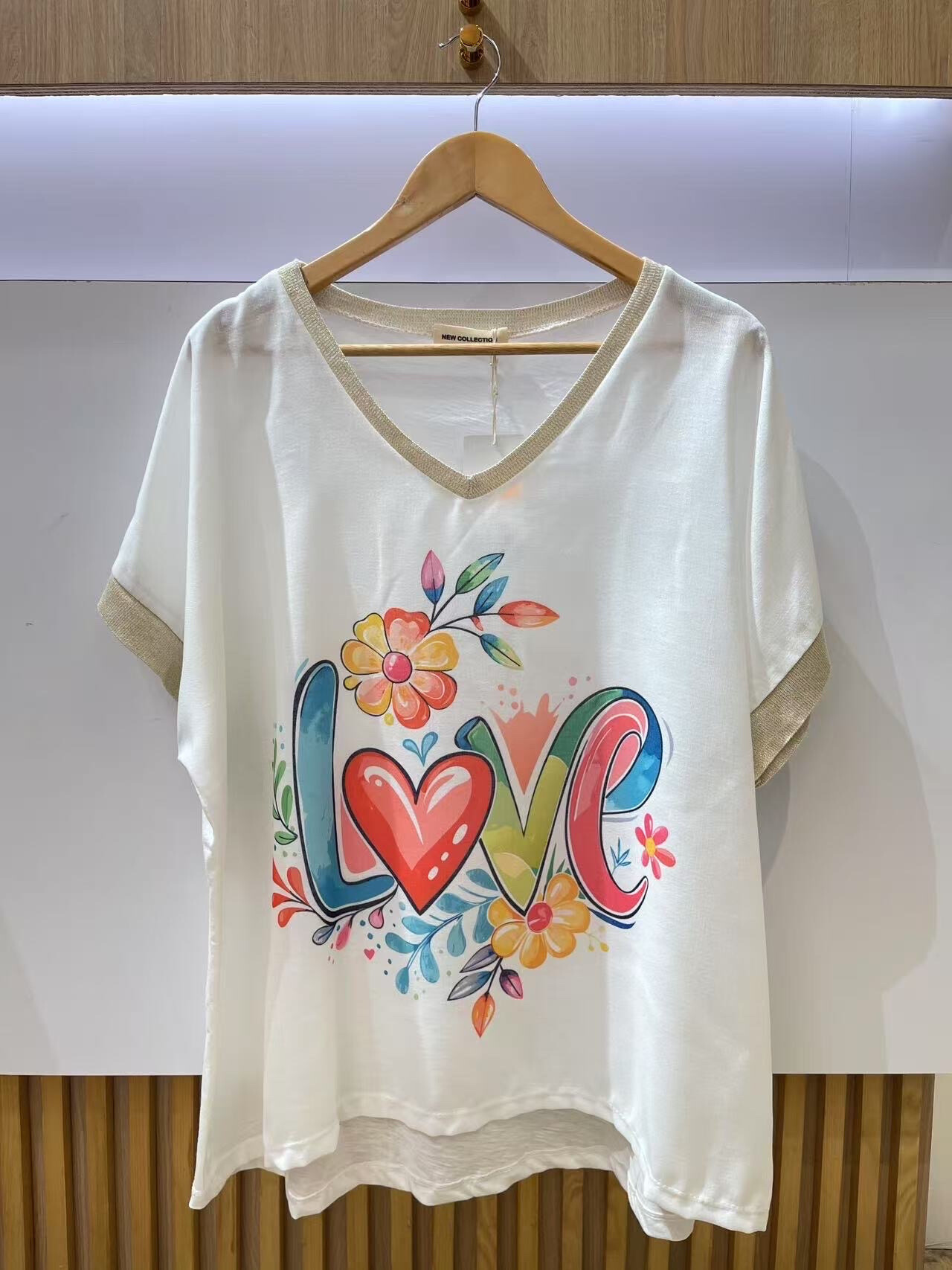 Wholesaler VIViCHY GRANDE TAILLE - Golden V-neck t-shirt. With large print